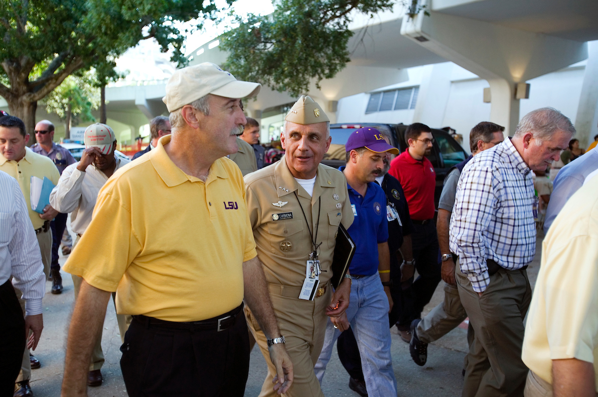 LSU Chancellor Sean O’Keefe and U.S. Surgeon General Vice Admiral Richard H. Carmona walk outside the Pete Maravich Assembly Center on .Sept. 4, 2005.