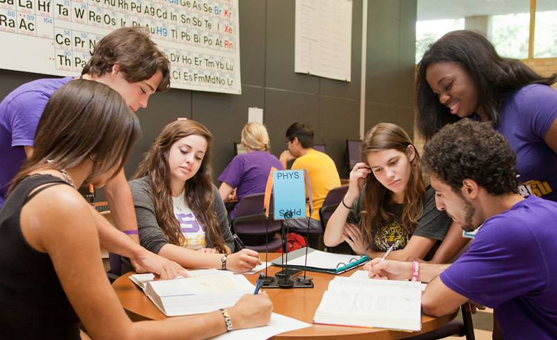 Student group working Group of students working together