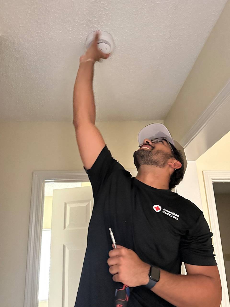 Mihir Babbar installs a smoke detector Mihir Babbar installs a smoke detector