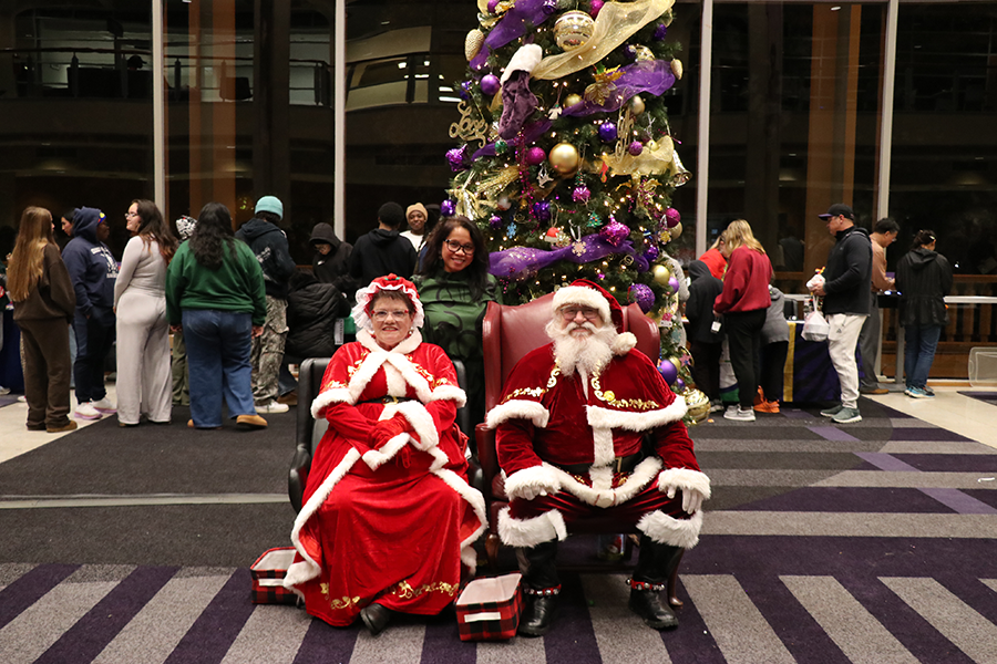 staff with Santa and Mrs. Claus
